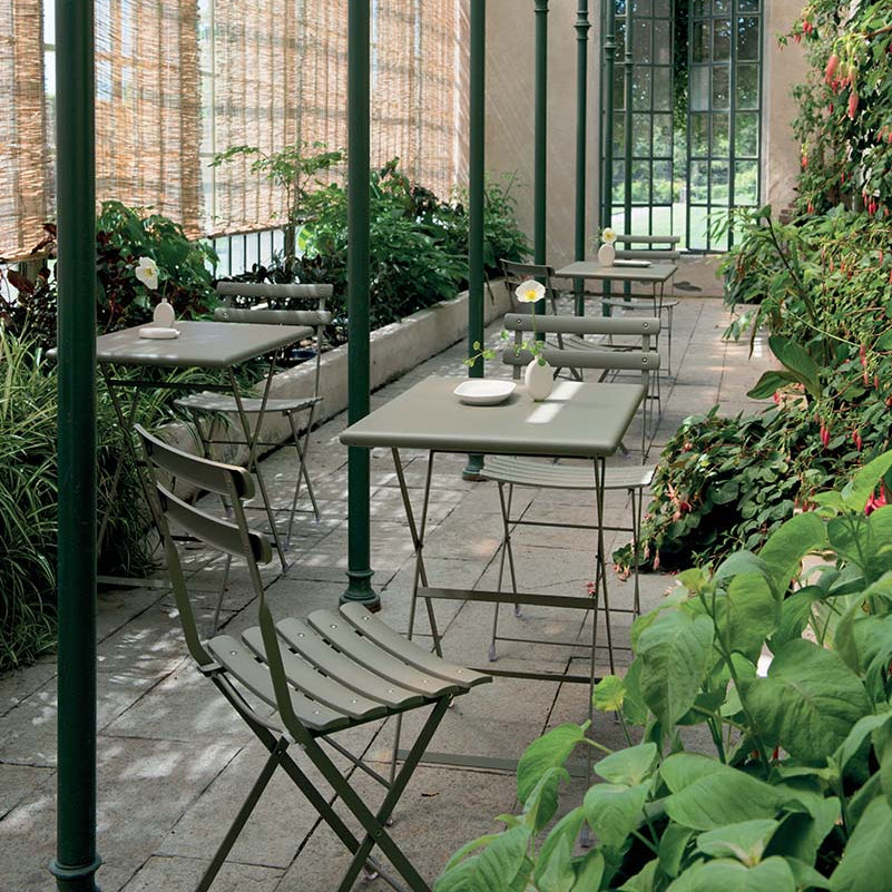 Folding Garden Tables in Natural Steel Finish | Greenhouse Setting | EMU Arc en Ciel