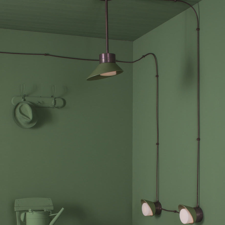 Modern green interior with Toscot pendant and wall lights | luxury home lighting setup | custom indoor and outdoor lighting | Toscot Chapeau