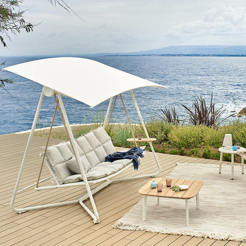 Coastal Outdoor Living Space | Luxury Swing Chair and Teak Coffee Table | EMU Shine