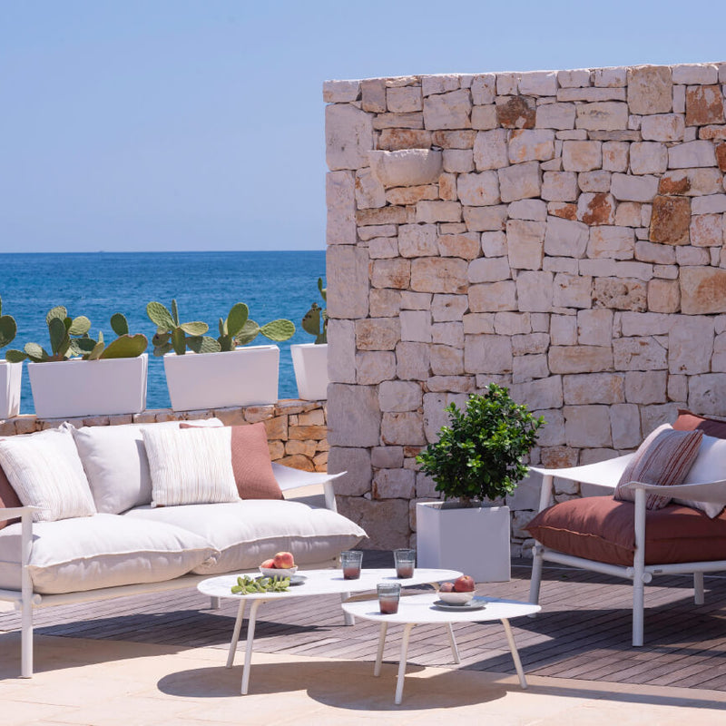 Outdoor Lounge Scene Featuring a Modern Coffee Table | Italian Outdoor Furniture | Luxury Exterior Design | High-Quality Garden Coffee Table | EMU Terramare