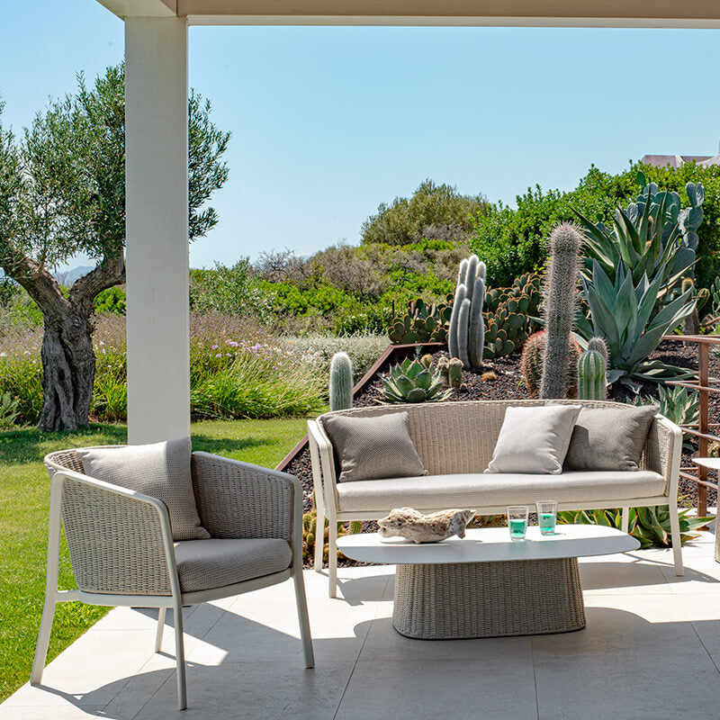 Elegant outdoor setup with Minimal Flat Rope Garden Armchairs and a matching sofa in a neutral white tone, ideal for luxury garden spaces | EMU Carousel