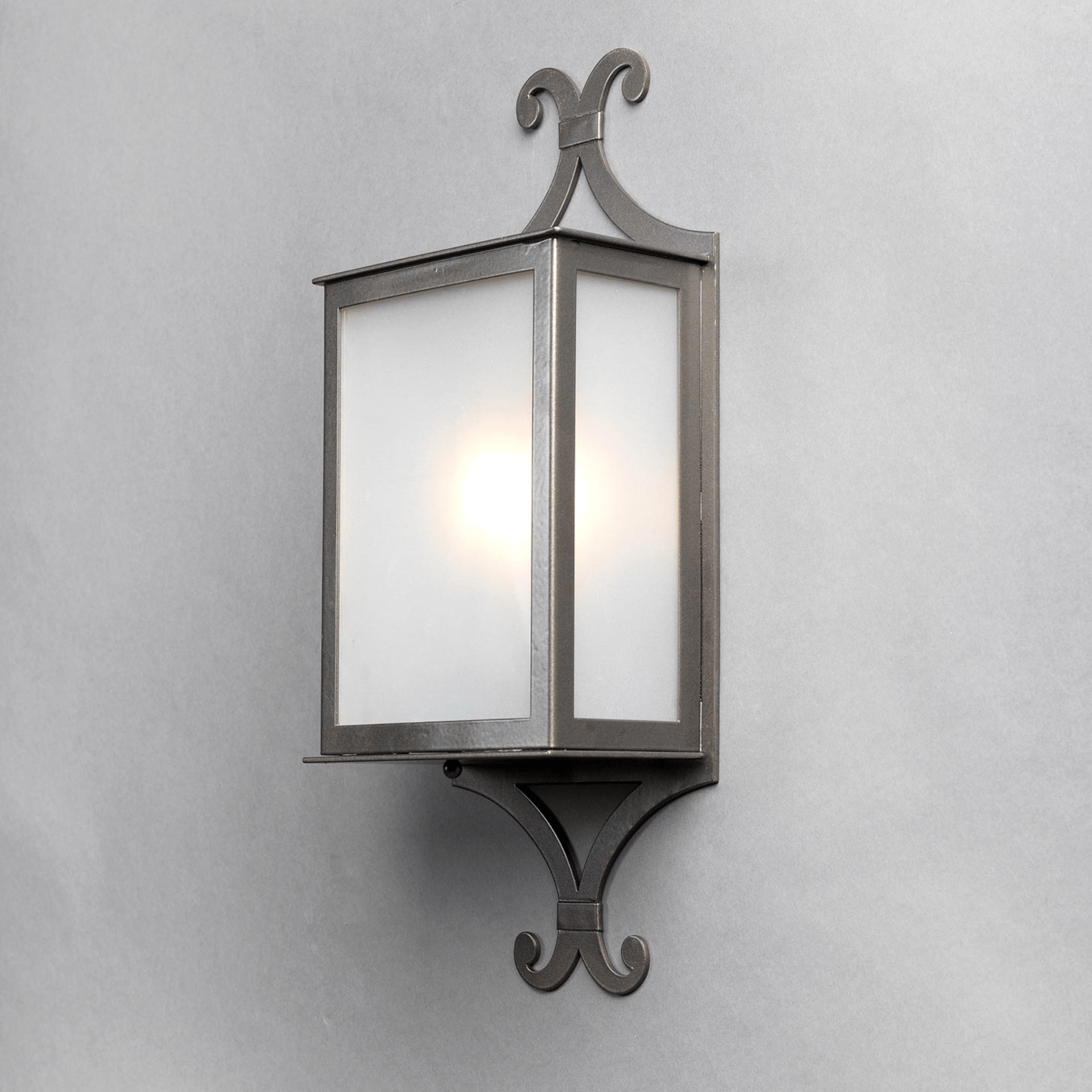 Side view of the IP54 rated luxury outdoor wall lantern | Frosted glass garden light with decorative frame | Designed and Made in Italy by Officina Ciani