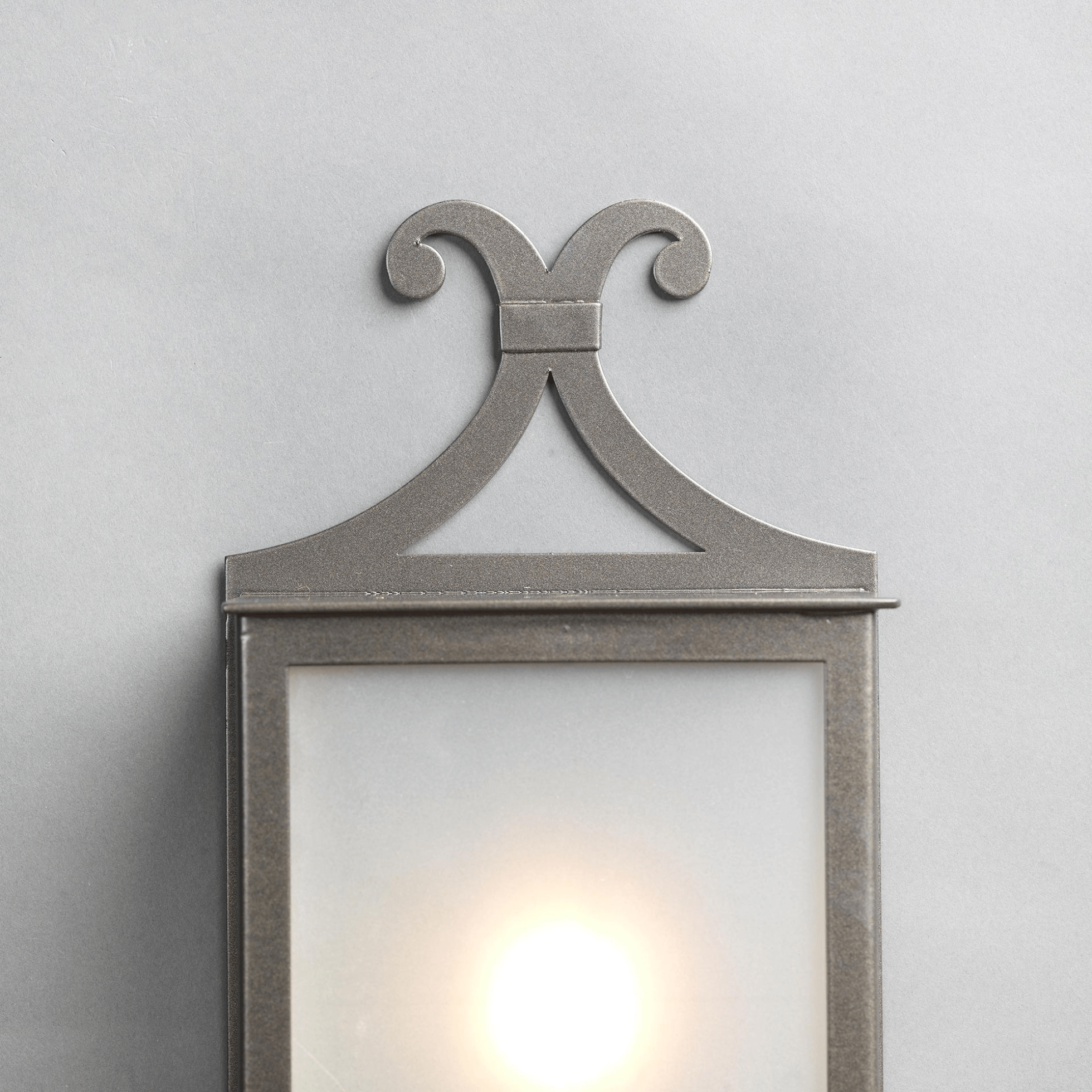 Decorative top detail of the IP54 rated outdoor wall lantern | Luxury metal garden light with frosted glass | Designed and Made in Italy by Officina Ciani