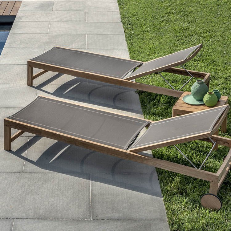 Ethimo Sand Sun Loungers in Garden Setting | Adjustable Teak Lounger with Durable Fabric | High-End Outdoor Sunbeds for Resort-Style Living