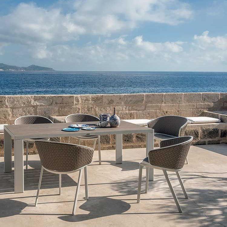 Outdoor Dining Table with Sea View Setup | High-End Outdoor Furniture for Alfresco Dining | Ethimo Esedra