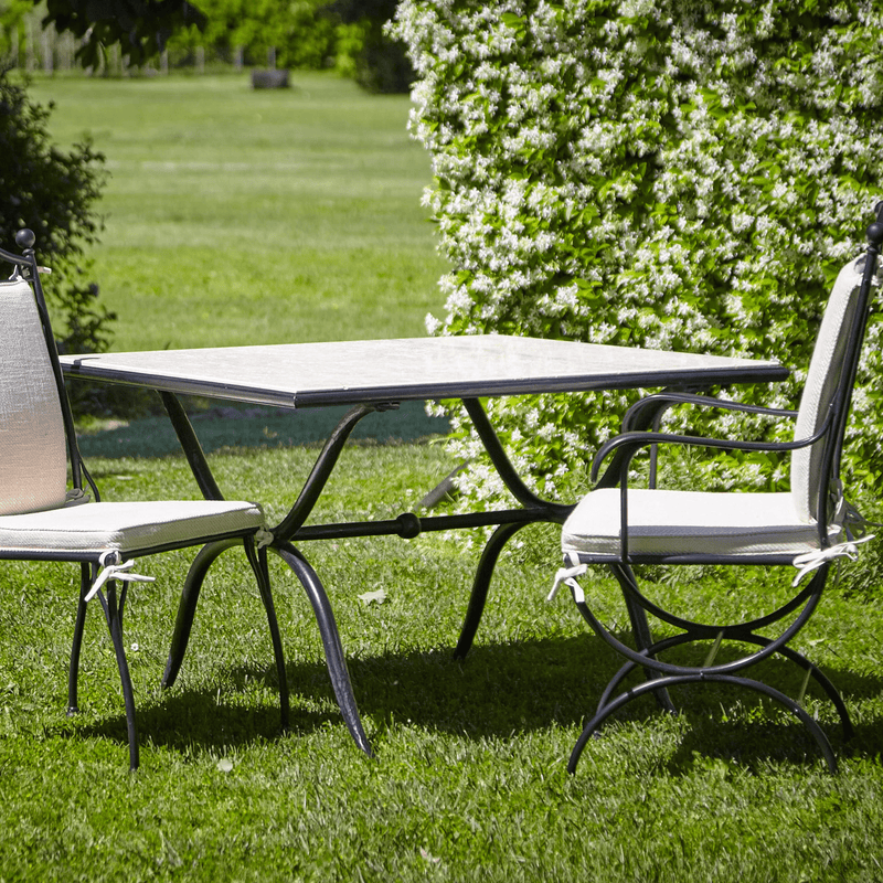 Square Iron Outdoor Dining Table With Marble Top in Garden Setting | Officina Ciani ROMBO | High-End Outdoor Dining Set | Luxury Outdoor Furniture | Designed and Made in Italy