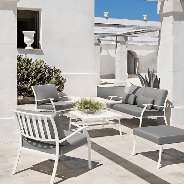 White Metal Outdoor Sofa and Chairs in Elegant Courtyard Setting | Luxury Outdoor Furniture | Durable Weather-Resistant Design 